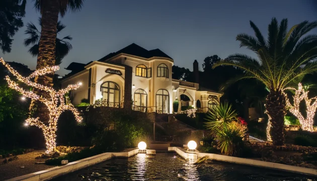 Luxurious California home illuminated with millions of lights, being deep cleaned by a European couple from Poppy House Cleaning.